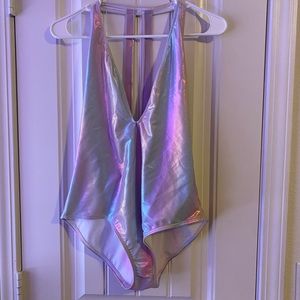 Out from under holographic body suit
